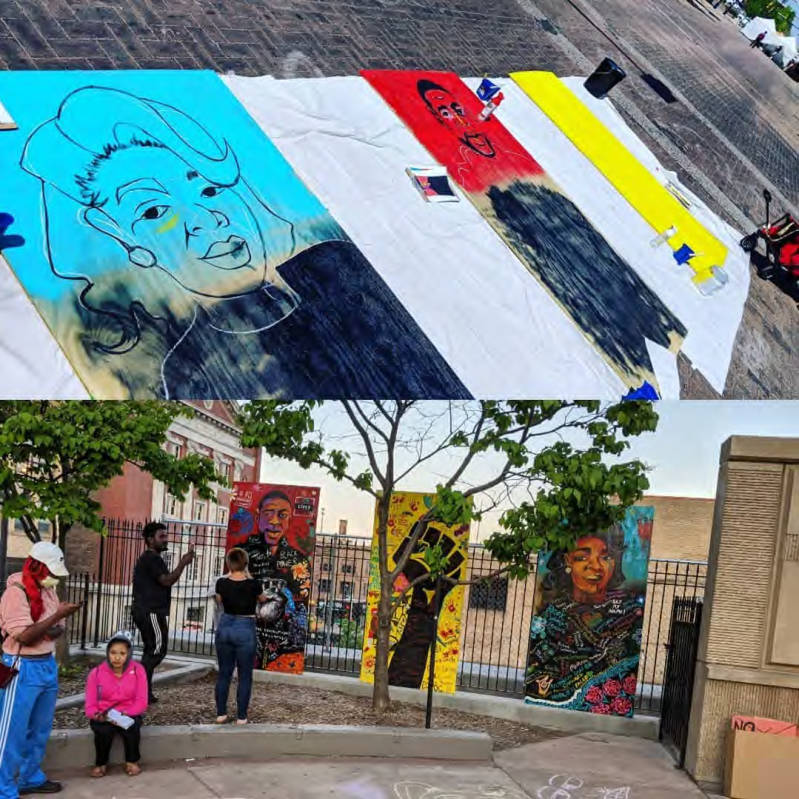 Photo of paintings in progress on the ground and installed at Clayton Jackson McGhie memorial