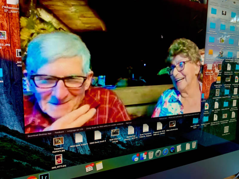 photo of a screen shot of an elderly couple in a zoom meeting